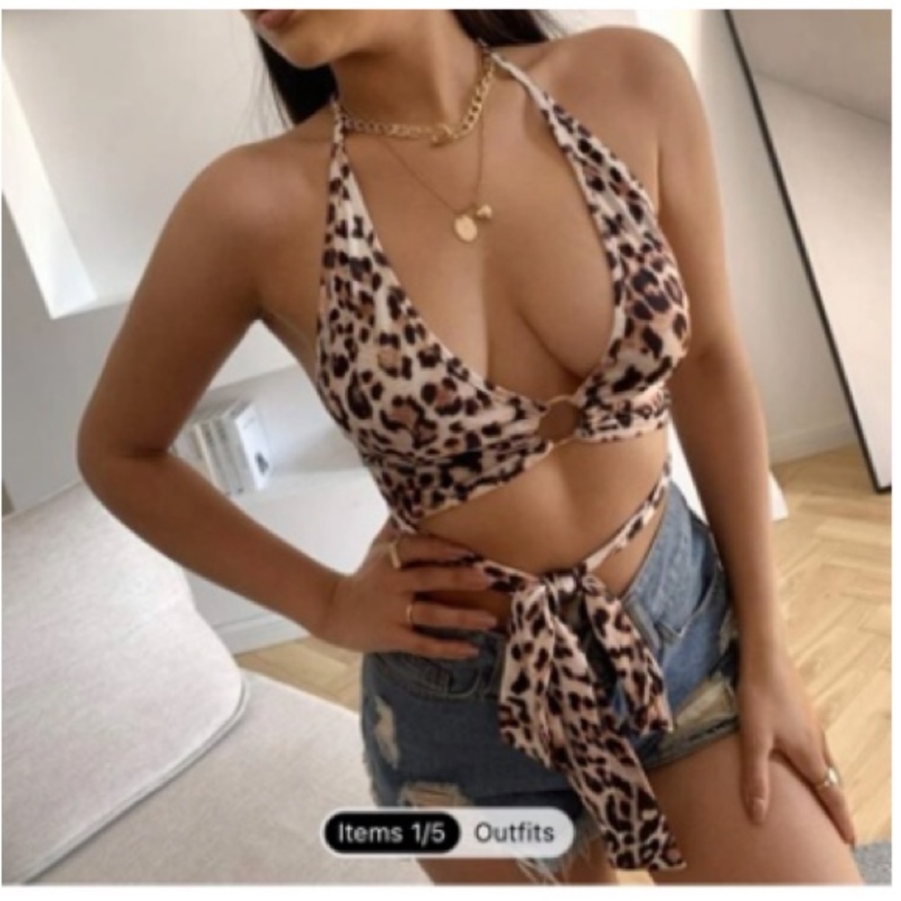 LOVED this halter summer tie animal print top. Very sexy